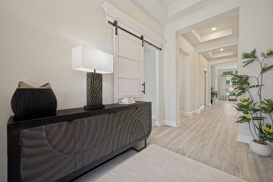 Step into a grand foyer where soaring ceilings, abundant natural light, and elegant architectural details create an unforgettable first impression. The contemporary front door, designer finishes, and thoughtfully curated accents set the tone for the sophisticated style and exceptional craftsmanship showcased throughout the home. Step into a grand foyer where soaring ceilings, abundant natural light, and elegant architectural details create an unforgettable first impression. The contemporary front door, designer finishes, and thoughtfully curated accents set the tone for the sophisticated style and exceptional craftsmanship showcased throughout the home.