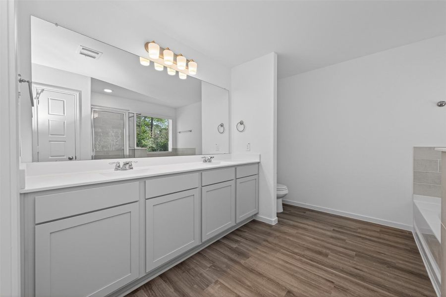 Furnished interior view inside a new home in Enclave at Willis, Willis (Image 12).