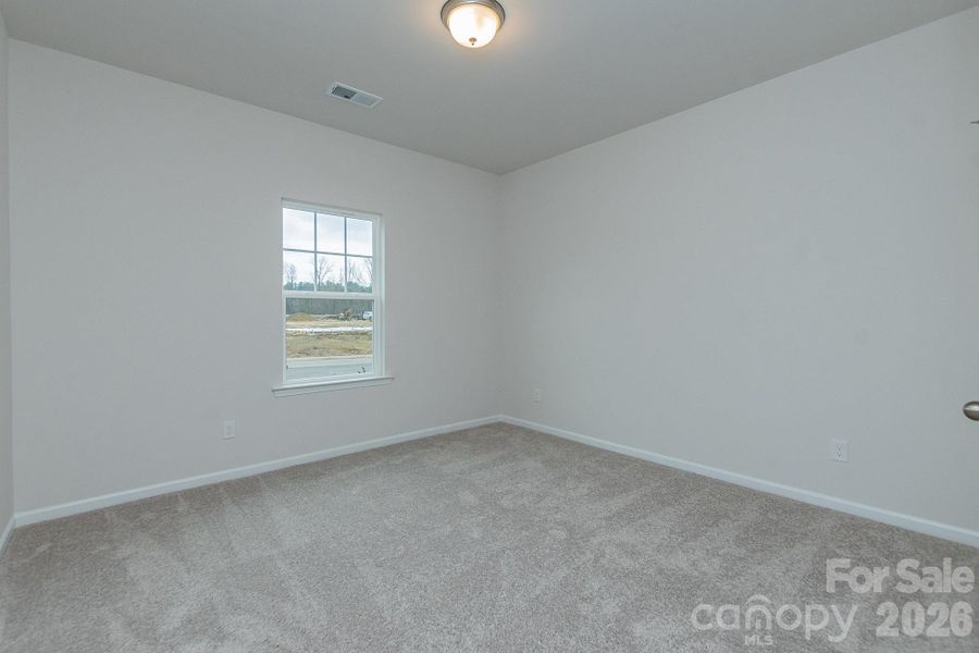 Spacious, unfurnished interior of a new home in Pine Bluff, Midland (Image 27).
