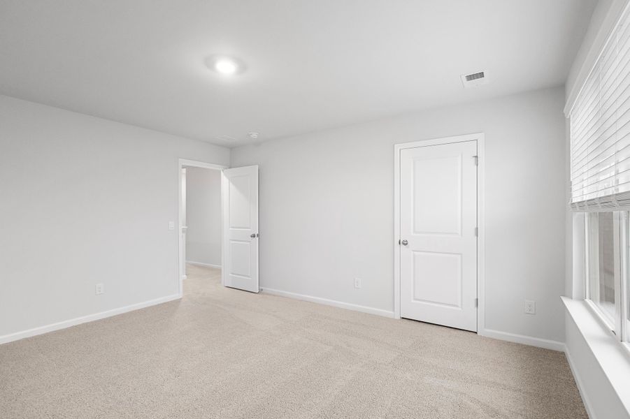 Spacious, unfurnished interior of a new home in The Cove at Mallard Crossing, Summerville (Image 18).