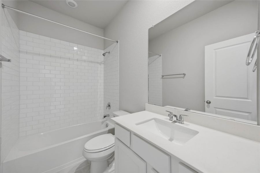 Furnished interior view inside a new home in Sunterra 40, Katy (Image 10).