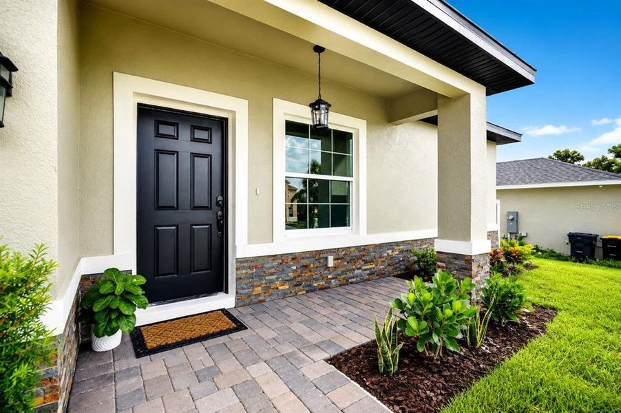 Exterior details and patio area of a home in , Poinciana (Image 3).