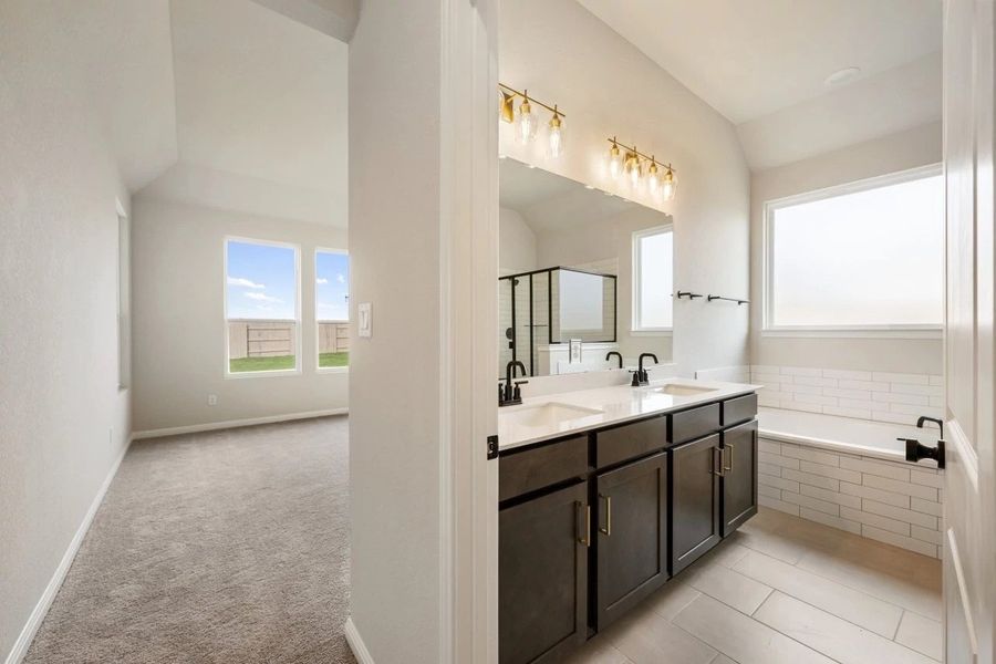 Furnished interior view inside a new home in The Colony 50s, Bastrop (Image 15).