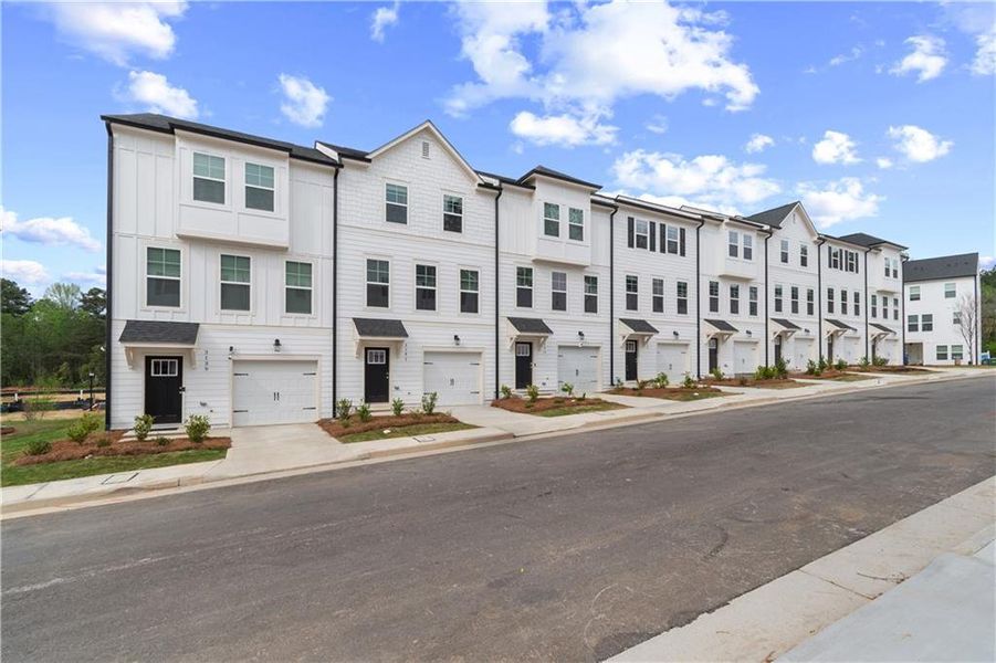 Front exterior of a new home in Monticello, Atlanta, GA, highlighting curb appeal (Image 15). Front exterior of a new home in Monticello, Atlanta, GA, highlighting curb appeal (Image 15).