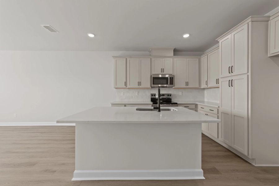 Furnished interior view inside a new home in Blue Heron Retreat, Little River (Image 7).