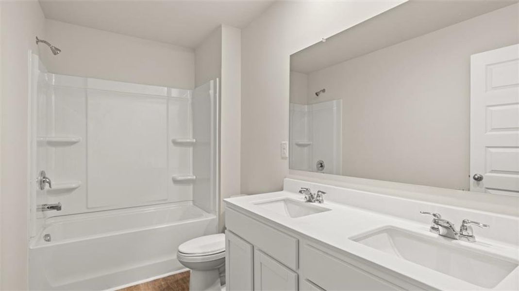 Furnished interior view inside a new home in Preserve at Dove Creek, Statham (Image 17).