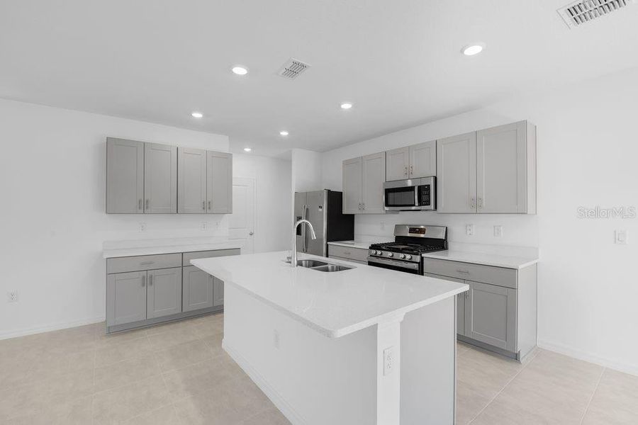 Furnished interior view inside a new home in Waterstone, Groveland (Image 14). Furnished interior view inside a new home in Waterstone, Groveland (Image 14).