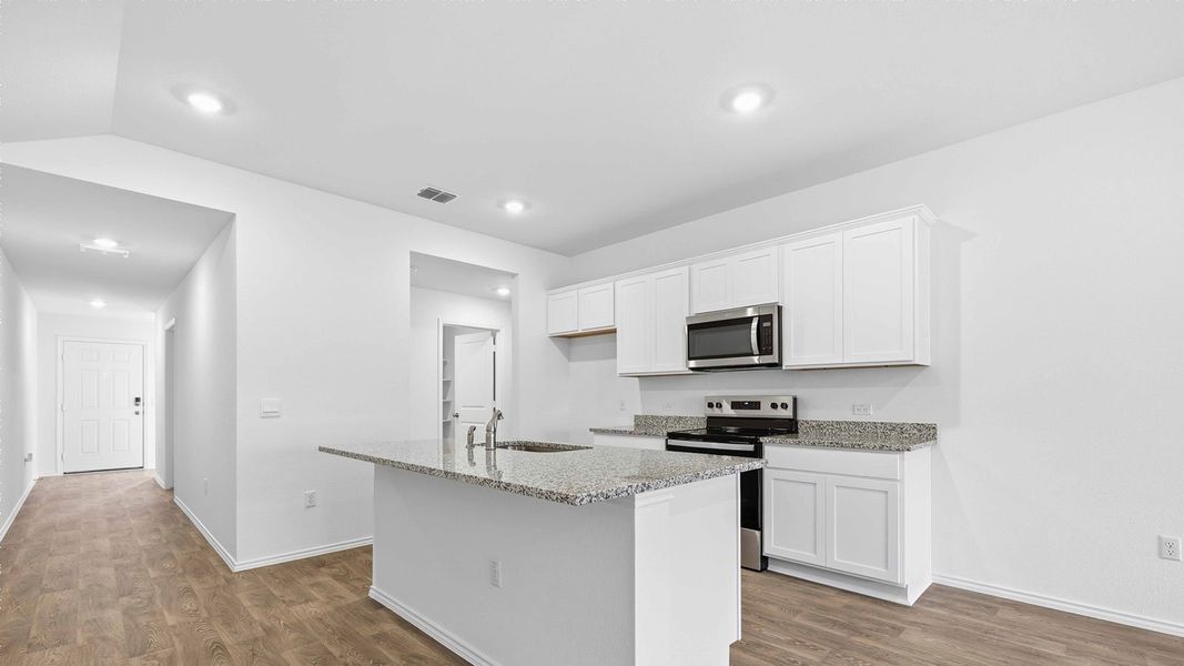 Furnished interior view inside a new home in Palomino, Manor (Image 6).