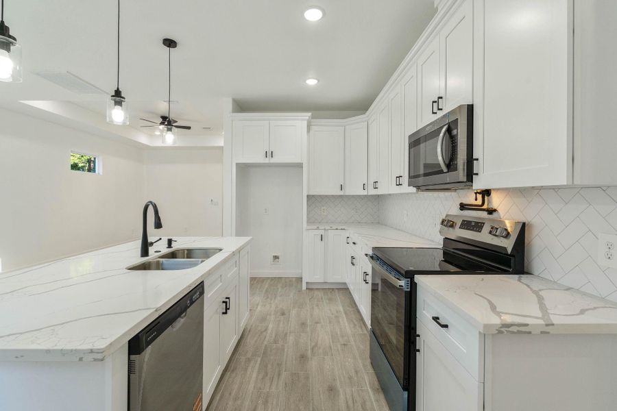 Furnished interior view inside a new home in , Willis (Image 4). Furnished interior view inside a new home in , Willis (Image 4).