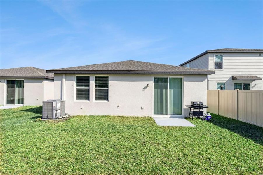 Exterior details and patio area of a home in Salt Meadows - Premier Series, Parrish (Image 21).