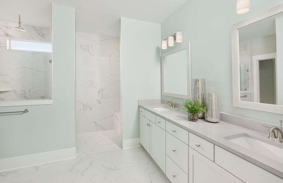 With a luxurious walk-in shower with a bench, you can create an at-home spa experience in the Owner's Bath. With a luxurious walk-in shower with a bench, you can create an at-home spa experience in the Owner's Bath.