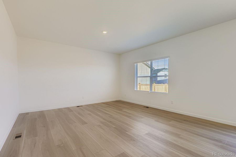 Spacious, unfurnished interior of a new home in Eastcreek Farm: The Camden Collection, Thornton (Image 10).