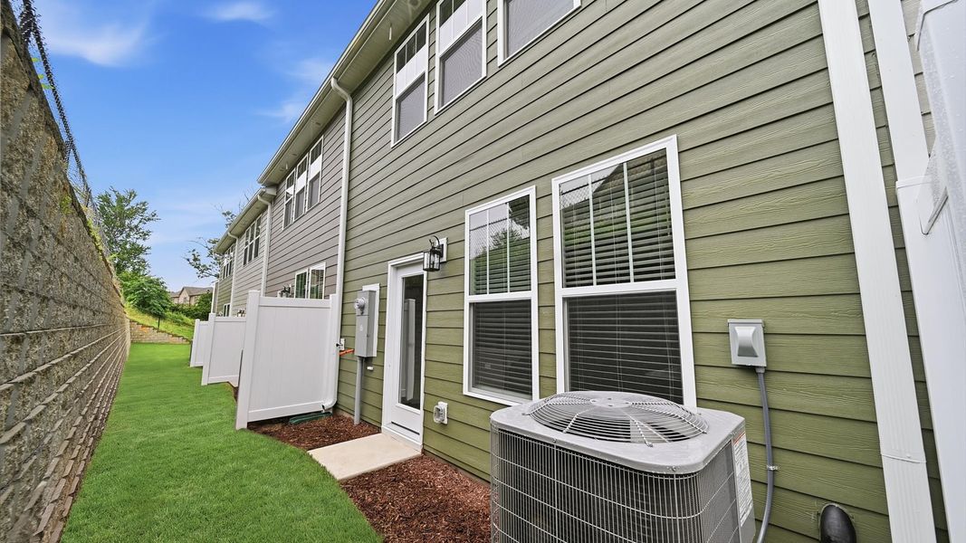 Exterior details and patio area of a home in Clayton Crossing, Arden (Image 4).