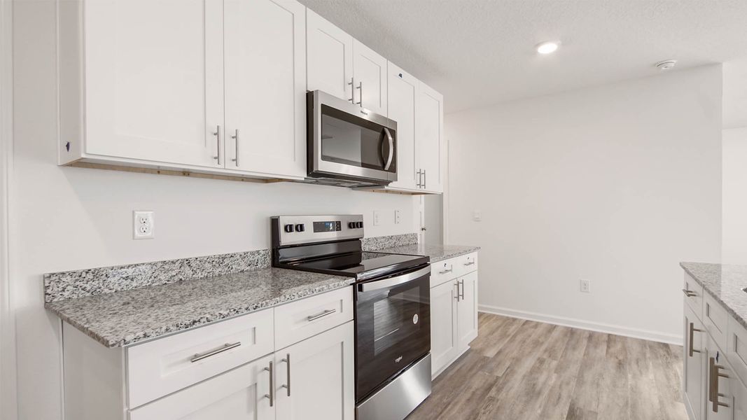 Representative furnished interior of a home built from the Robie by D.R. Horton in Riverwalk, Freeport (Image 9).