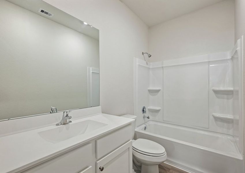 Secondary bathroom with a tub/shower combination Secondary bathroom with a tub/shower combination