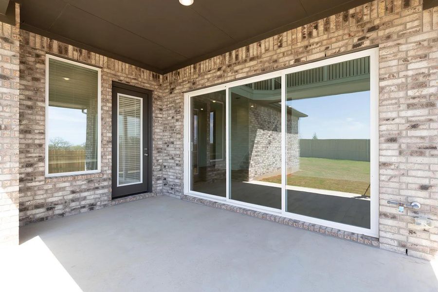 Exterior details and patio area of a home in The Colony - 50', Bastrop (Image 3).