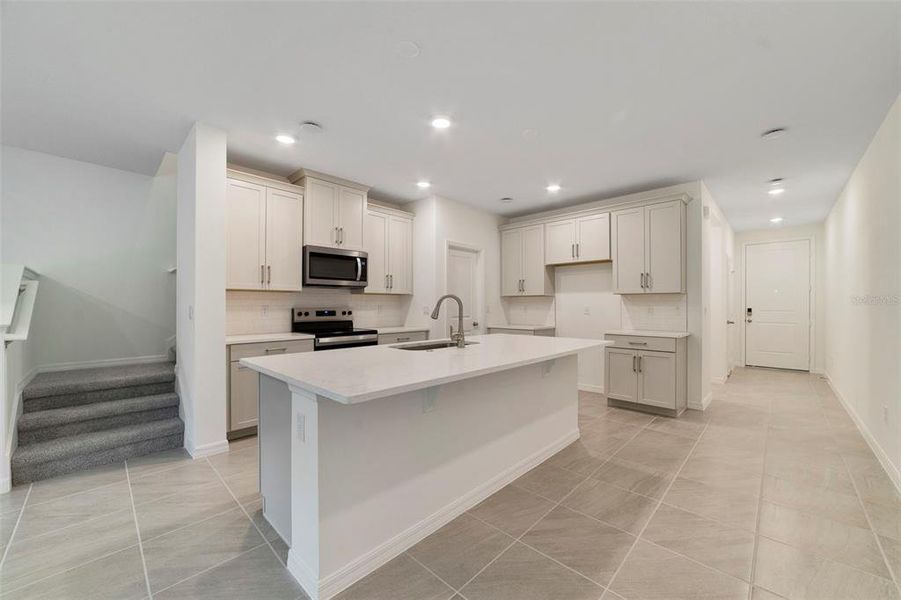 Furnished interior view inside a new home in Towns at Greenleaf, Oviedo (Image 6).