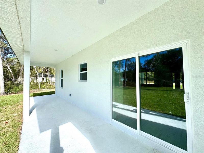 Exterior details and patio area of a home in , Citrus Springs (Image 19).