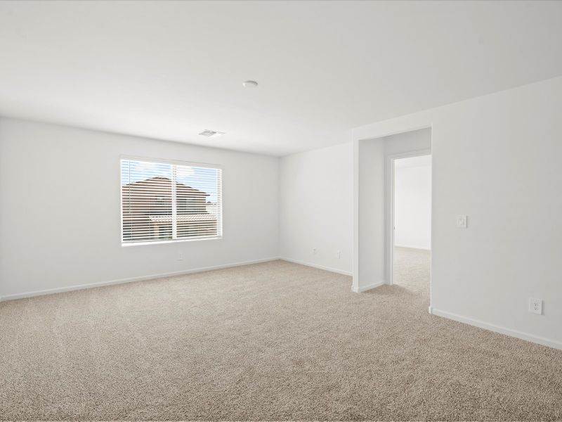 Spacious, unfurnished interior of a new home in Mandarina - Signature Series, Marana (Image 13).