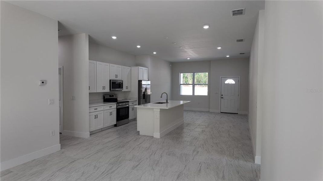 Furnished interior view inside a new home in , Dunnellon (Image 7).