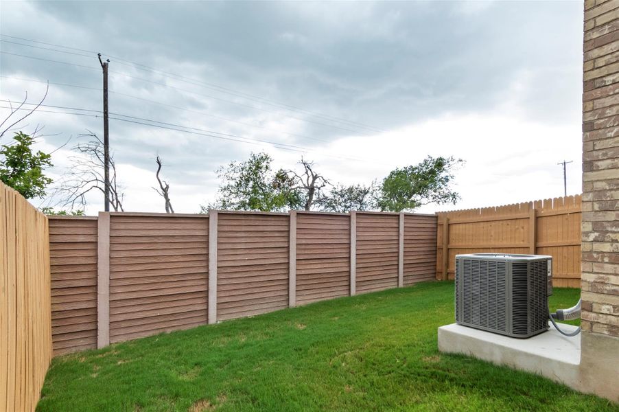 Front exterior of a new home in Saddle Creek Twinhomes, Georgetown, TX, highlighting curb appeal (Image 23).