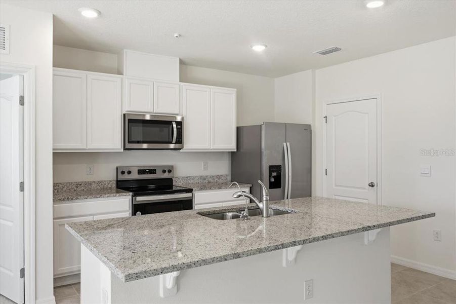 Furnished interior view inside a new home in Oak Pointe, Apopka (Image 22). Furnished interior view inside a new home in Oak Pointe, Apopka (Image 22).