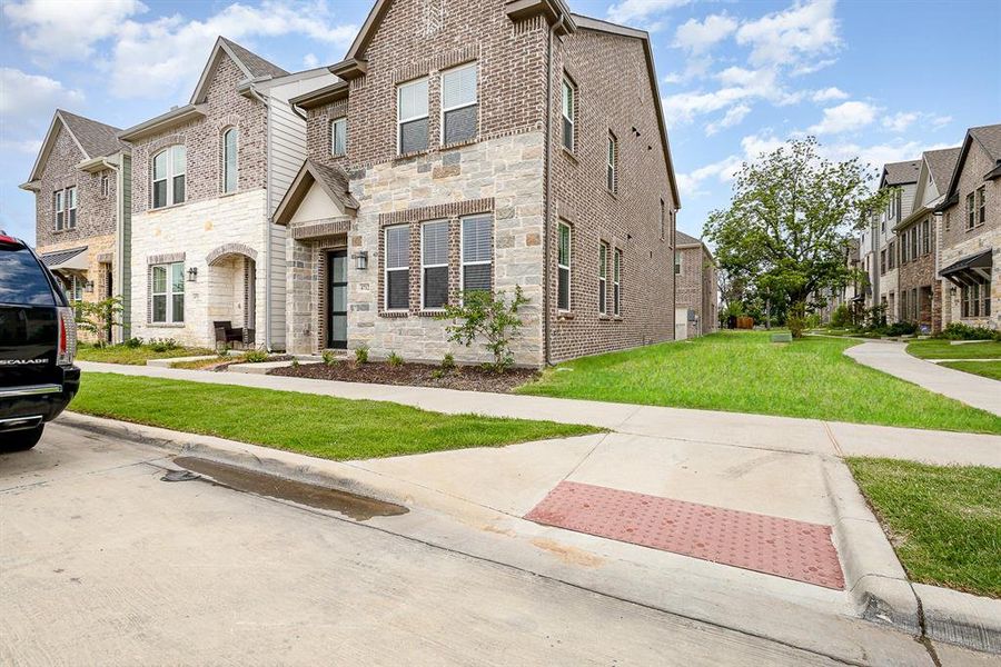 Front exterior of a new home in , Dallas, TX, highlighting curb appeal (Image 18). Front exterior of a new home in , Dallas, TX, highlighting curb appeal (Image 18).
