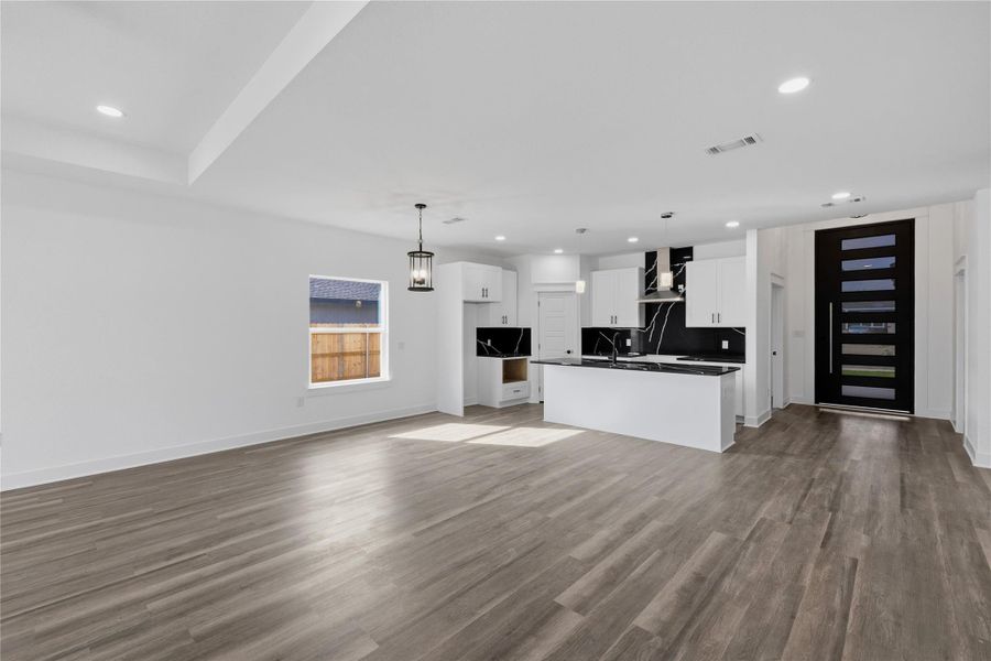 Kitchen view and dining view from the living area.