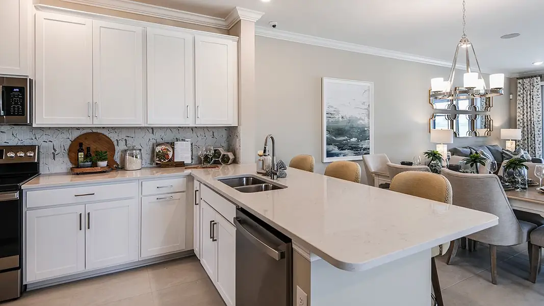 Representative furnished interior of a home built from the Avanti VII by Taylor Morrison in Esplanade at Rivergrass Condos, Naples (Image 4).
