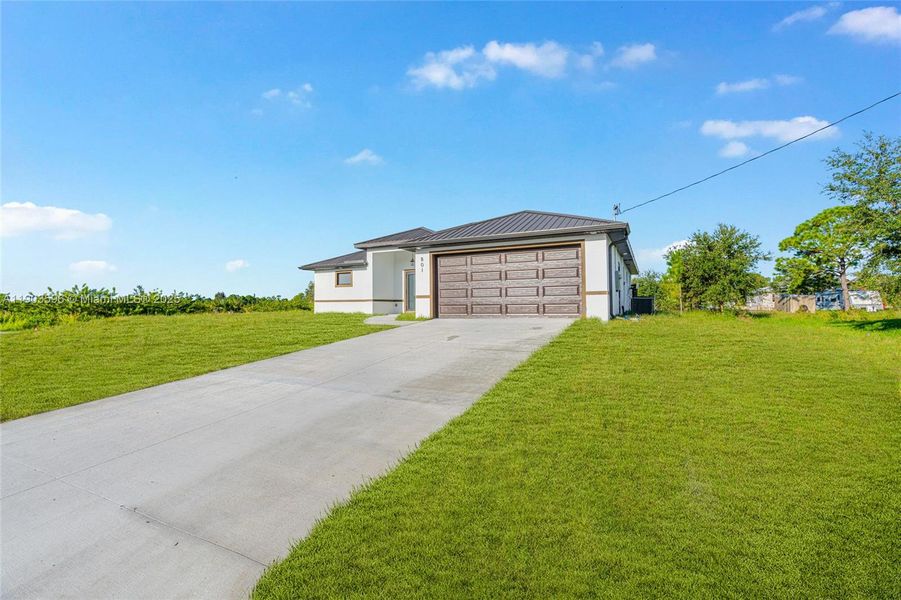 Exterior details and patio area of a home in , Lehigh Acres (Image 26).