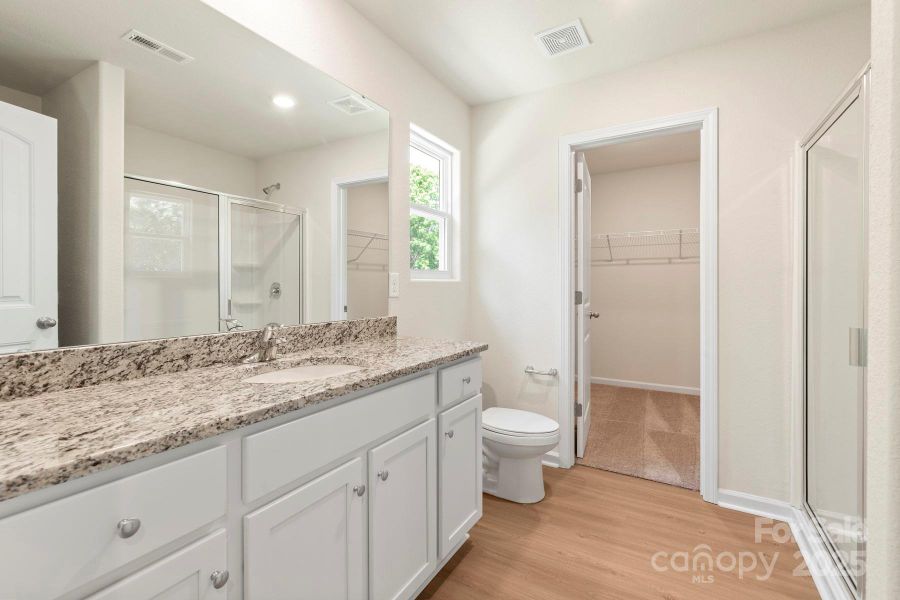 Furnished interior view inside a new home in Stagecoach Station, Gastonia (Image 5).
