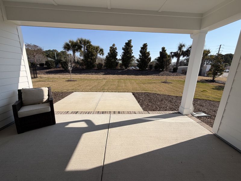Exterior details and patio area of a home in The Sanctuary at Sunset Beach, Sunset Beach (Image 3).