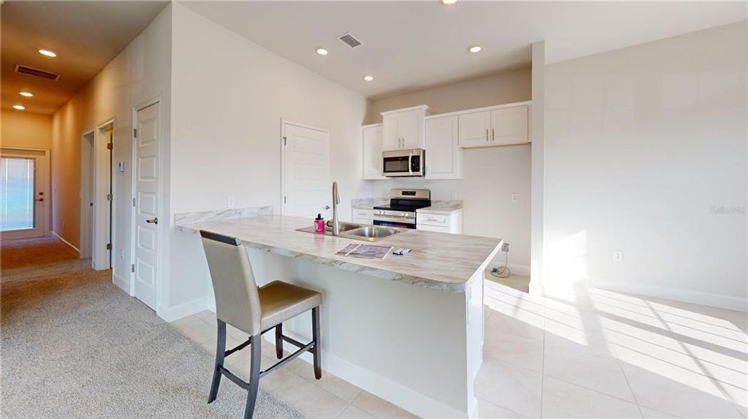 Furnished interior view inside a new home in Rolling Hills, Bell (Image 9).