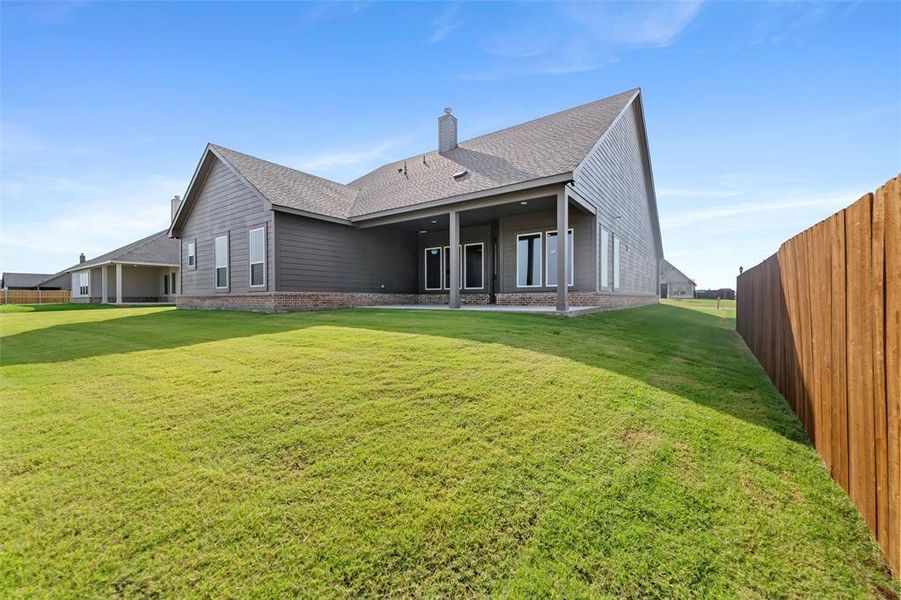 Exterior details and patio area of a home in Fairview Meadows, New Fairview (Image 2). Exterior details and patio area of a home in Fairview Meadows, New Fairview (Image 2).