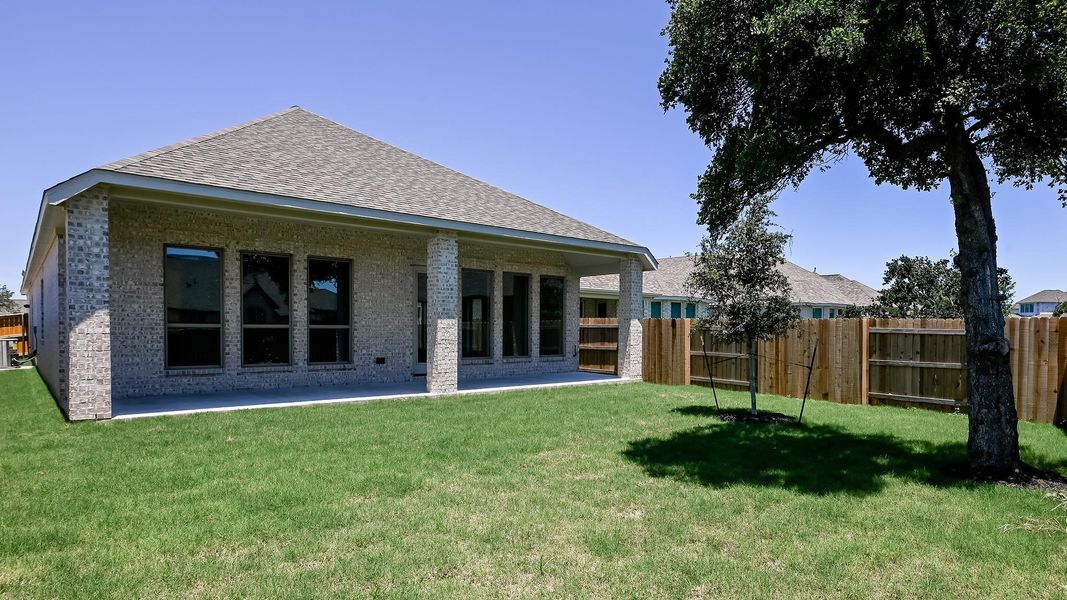 Exterior details and patio area of a home in 6 Creeks, Kyle (Image 3).