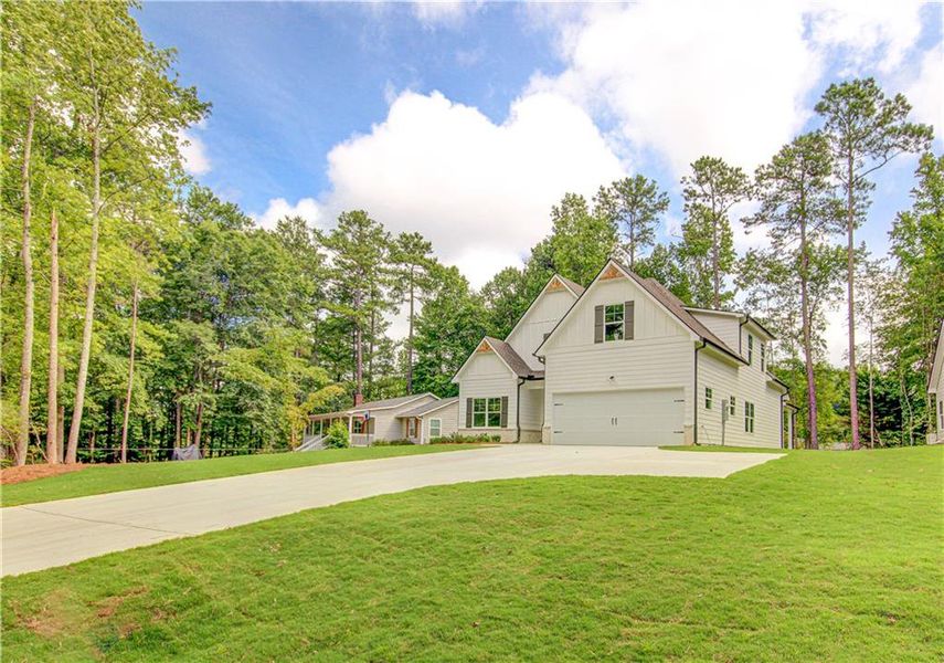 Front exterior of a new home in , Villa Rica, GA, highlighting curb appeal (Image 26).