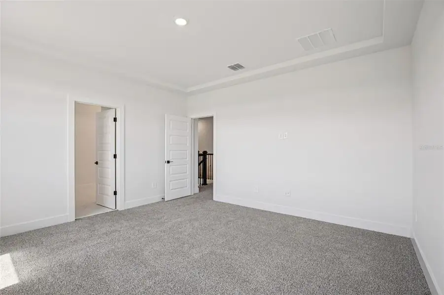 Spacious, unfurnished interior of a new home in Magnolia Bay - Reserve Series, Nokomis (Image 30).