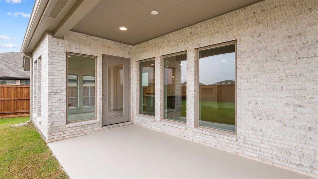 Exterior details and patio area of a home in Myrtle Creek 60', Waxahachie (Image 2).