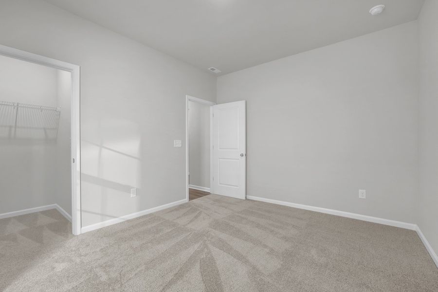 Spacious, unfurnished interior of a new home in River Tide Farms, Bolivia (Image 23).