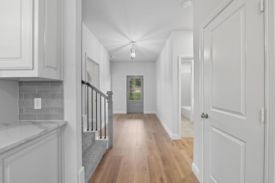 Representative unfurnished interior of a home built from the Garrison III by Cheldan Homes in Arbor Oaks, Boyd (Image 15).