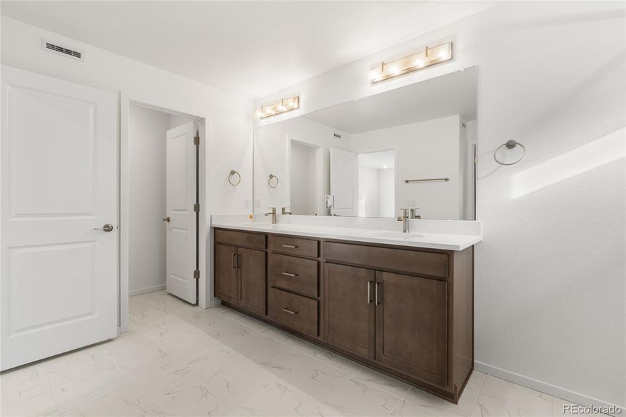 Furnished interior view inside a new home in Harvest Crossing, Aurora (Image 13).