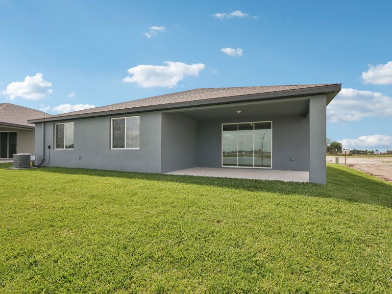 Exterior details and patio area of a home in Oakfield Trails - Signature Series, Parrish (Image 3). Exterior details and patio area of a home in Oakfield Trails - Signature Series, Parrish (Image 3).