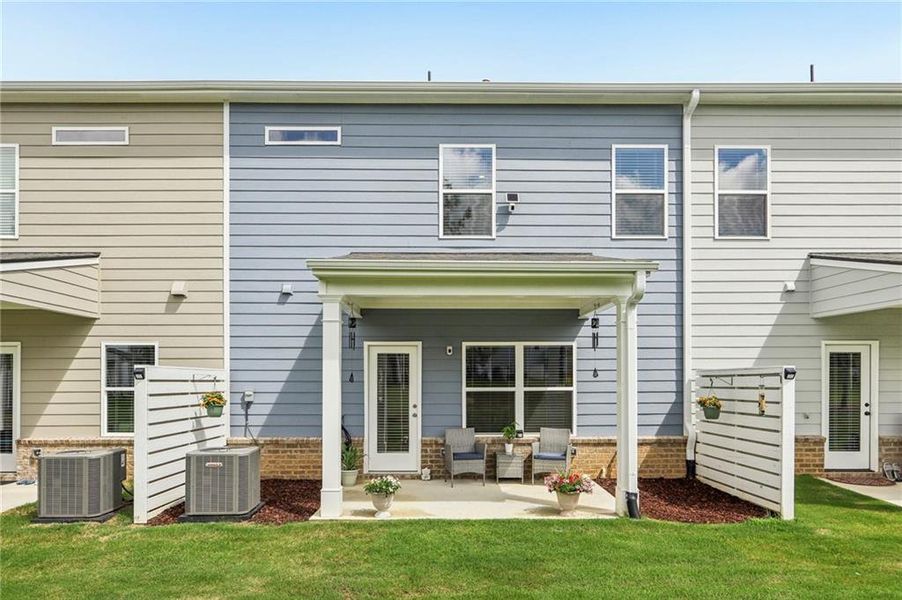Exterior details and patio area of a home in Ellison Square, Sugar Hill (Image 4).