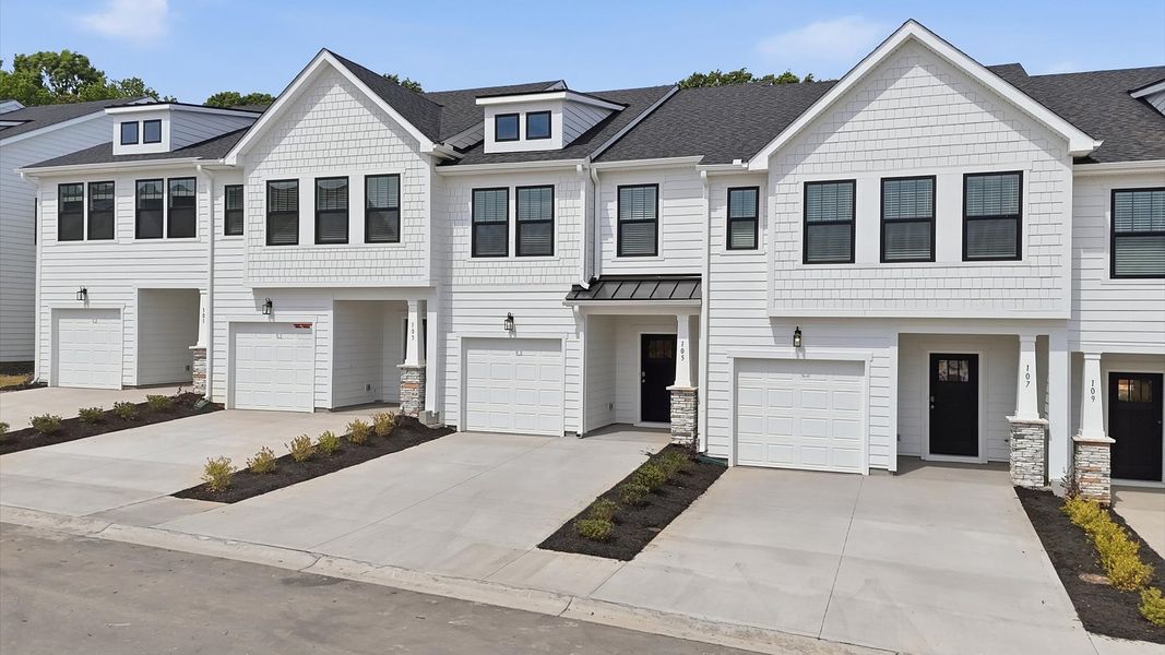 Front exterior of a new home in Gresham Station, Simpsonville, SC, highlighting curb appeal (Image 20).