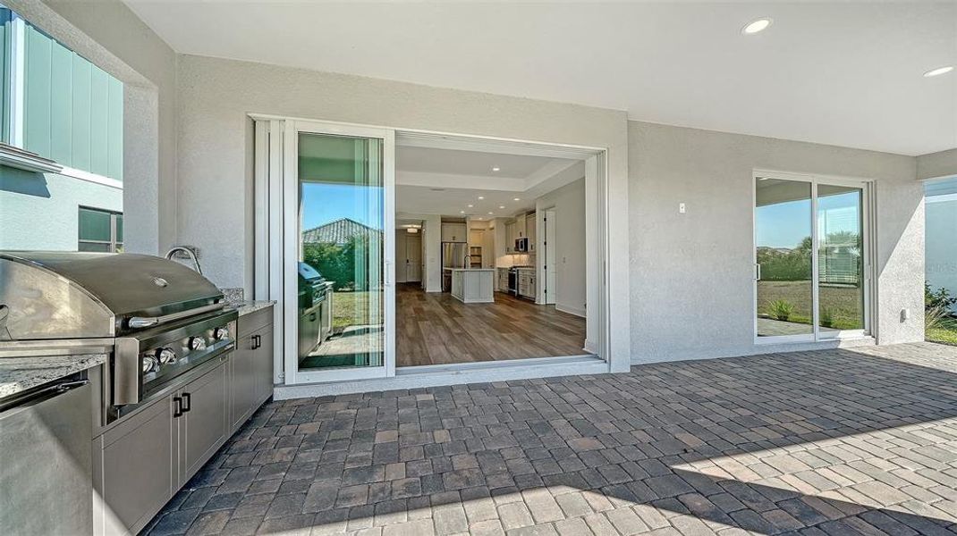 Exterior details and patio area of a home in Windward, Sarasota (Image 16).