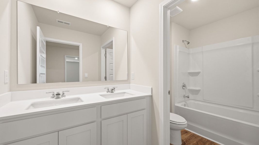 Furnished interior view inside a new home in Brooks Station, Dacula (Image 9).