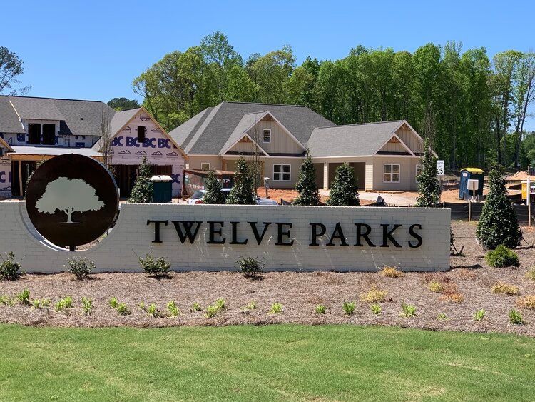 Entrance to the Twelve Parks community in Sharpsburg, GA, featuring signage and landscaping (Image 1).