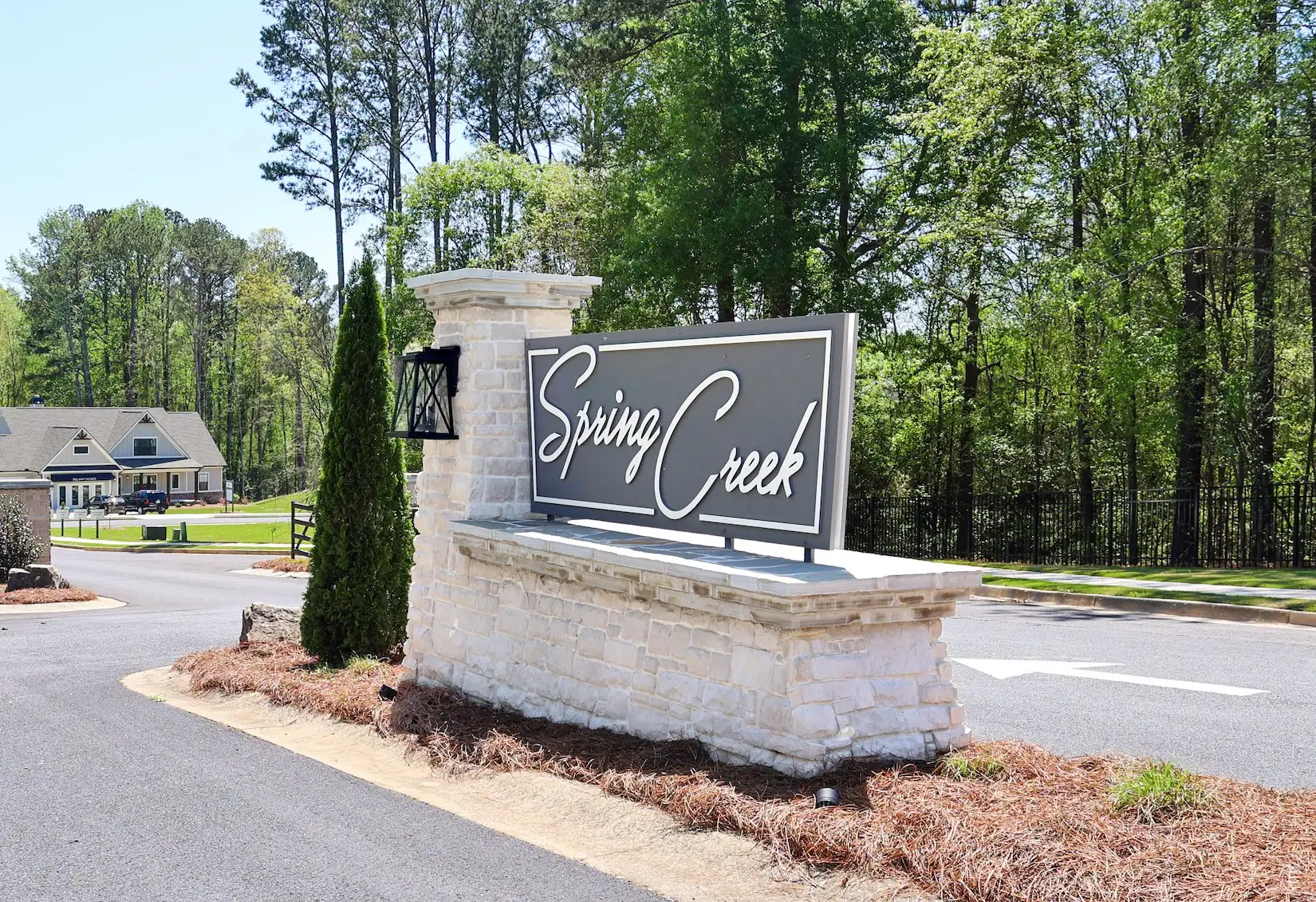 Entrance to the Spring Creek community in Monroe, GA, featuring signage and landscaping (Image 1). Entrance to the Spring Creek community in Monroe, GA, featuring signage and landscaping (Image 1).
