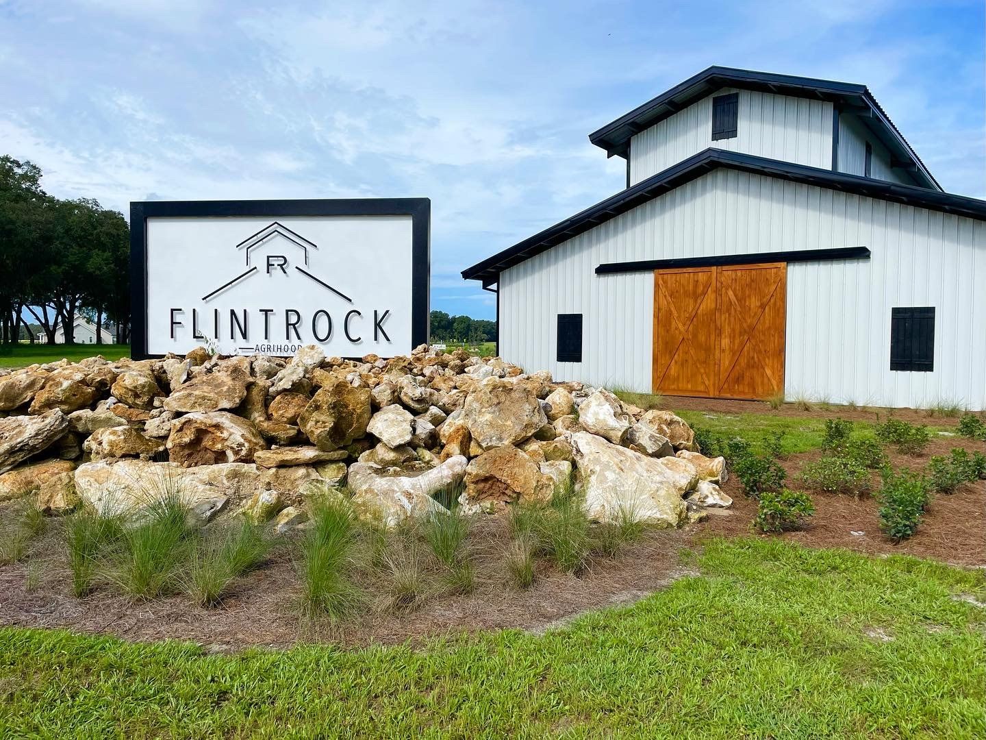 Front exterior of a home in the Flint Rock Agrihood community, located in Archer, FL (Image 1).