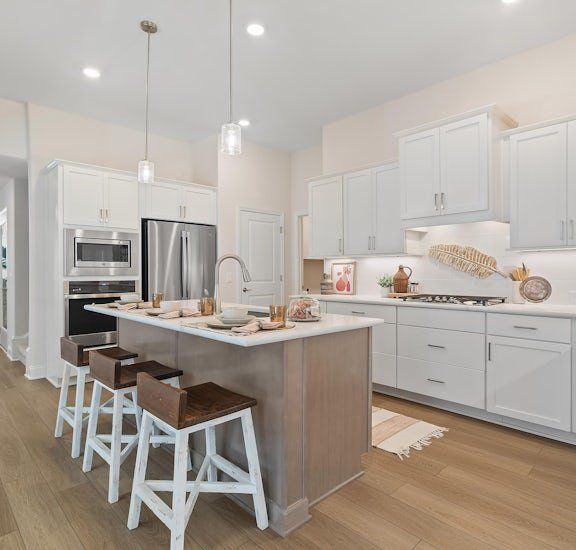 Furnished interior in a model home at Tabor Landing in Dallas (Image 1). Furnished interior in a model home at Tabor Landing in Dallas (Image 1).